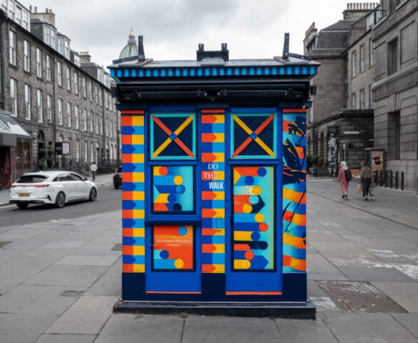 Repurposed Polis box outside the Johnnie Walker Experience at the west end of Princes Street, Edinburgh