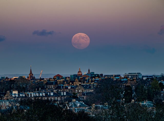 Wolf Moon over Edinburgh University viewed from Craighouse